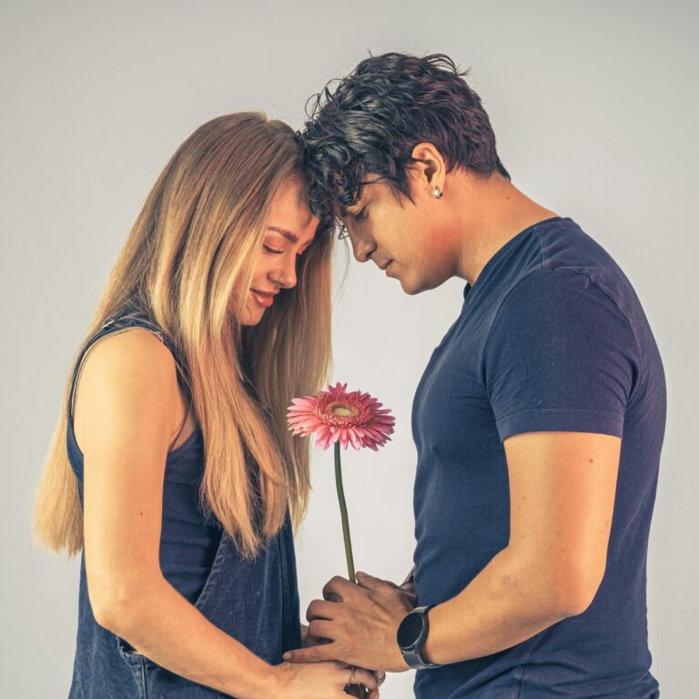A couple having a gentle conversation about sexual fantasies, exploring intimacy with female adult toys and pleasure toys for women.