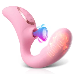 Close-up of a pink 15-mode heating clitoral sucking vibrator and vacuum stimulator dildo.