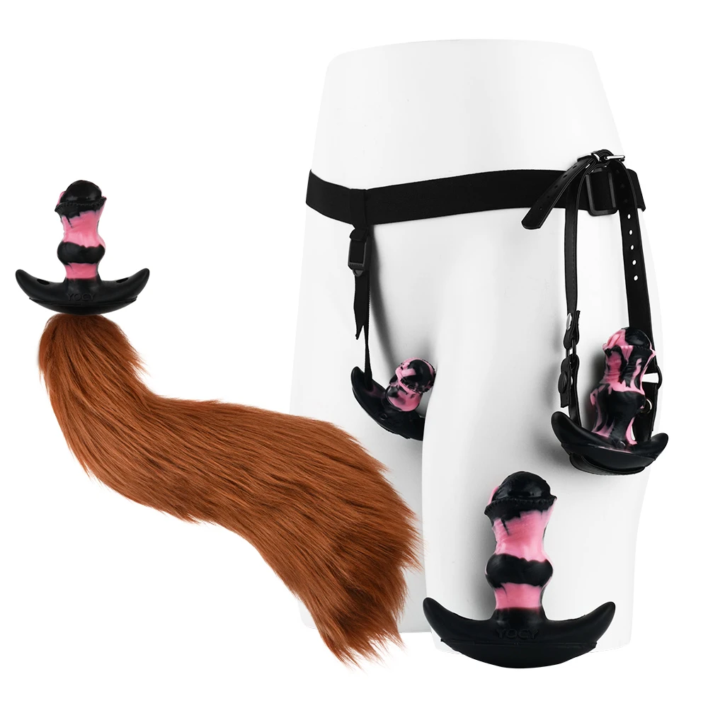 Xlucia Fox Tail Vibrator Set including wireless remote control, satin eye mask, and wearable fox tail accessory.