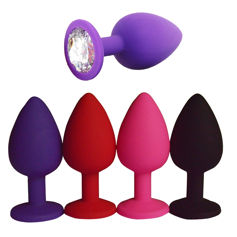 Three black silicone anal plugs in small, medium, and large sizes with flared bases on a plain background.