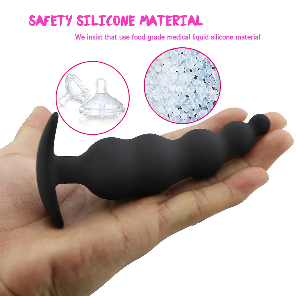 Black silicone anal beads with bullet tip and flared base for prostate massage.