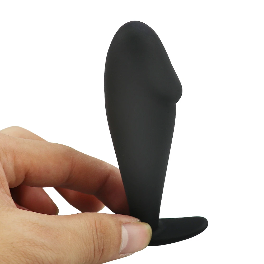 Black silicone anal beads with bullet tip and flared base for prostate massage.