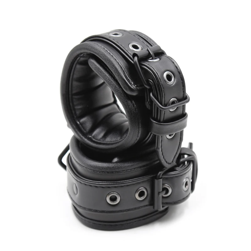 Pair of black soft leather handcuffs with silver metal hang buckles and links