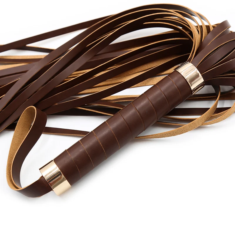 A black PU leather bondage flogger with long tassels and a textured handle for adult couples' games.