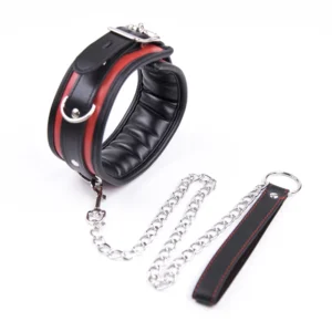 A black leather BDSM collar with a heavy iron chain link and soft sponge interior padding.
