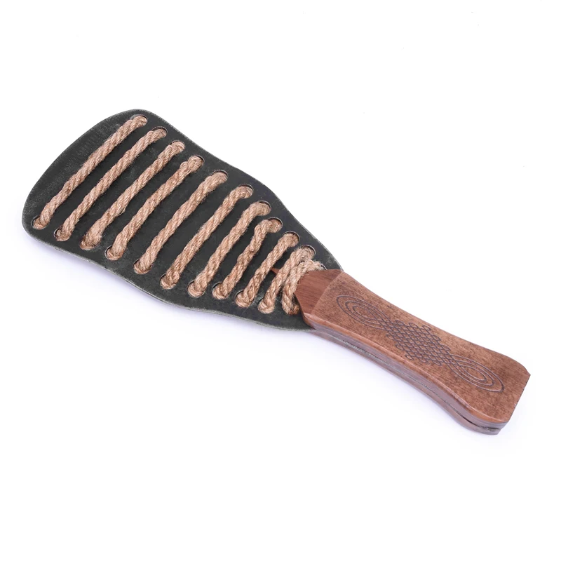 A professional iron plate BDSM spanking paddle alongside a textured hemp rope bondage whip for adult sensory play.