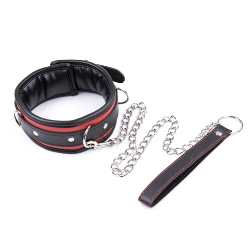 A black leather BDSM collar with a heavy iron chain link and soft sponge interior padding.