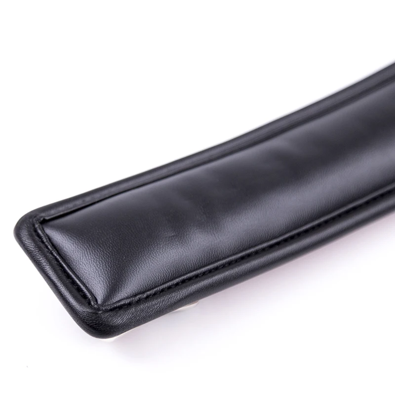 A black leather BDSM collar with a heavy iron chain link and soft sponge interior padding.