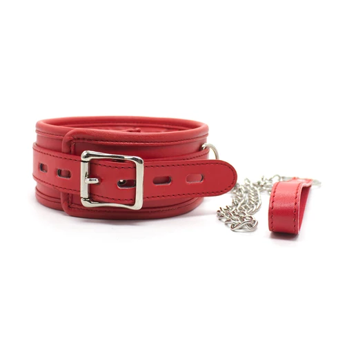 A black leather BDSM collar with a heavy iron chain link and soft sponge interior padding.