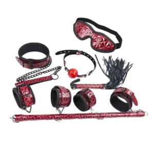 High-quality BDSM bondage set featuring black handcuffs, a leather whip, a ball gag, a buckled collar, and a metal spreader bar for adult toy play.