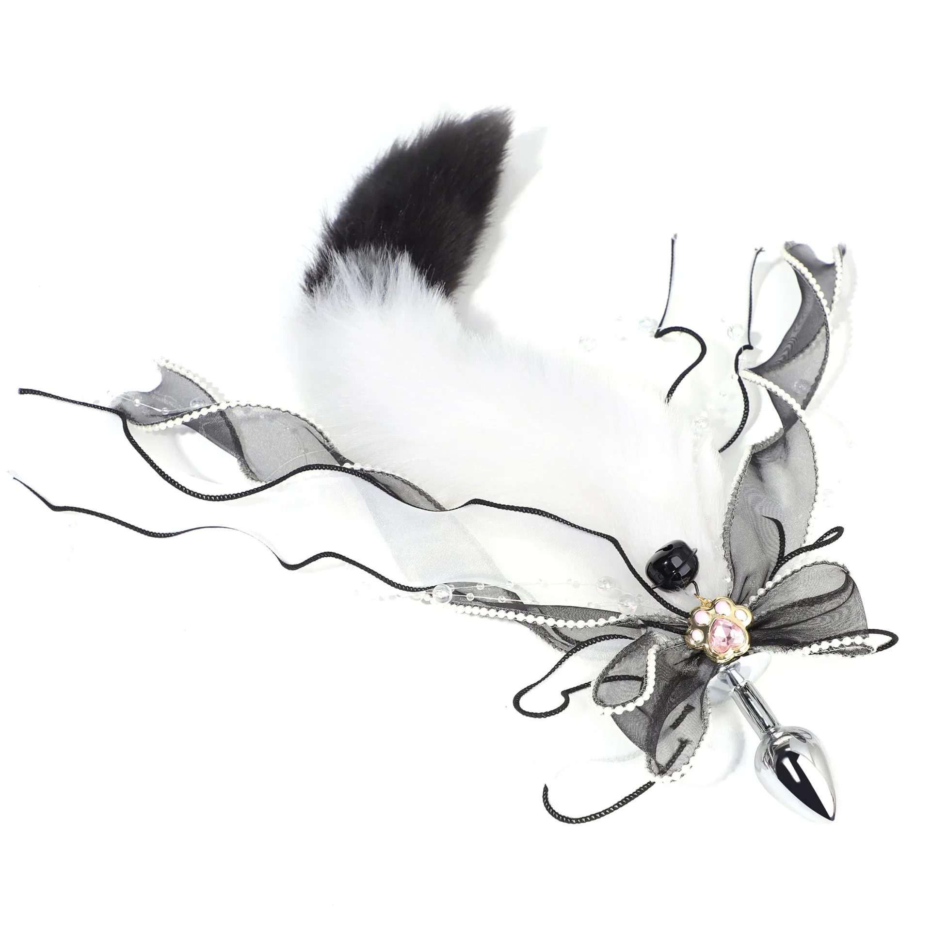 A metal anal plug with a colorful, plush fox tail attachment for erotic adult games.