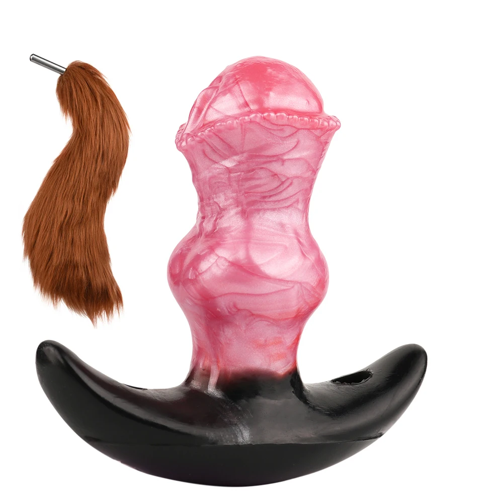 Silicone anal plug vibrator with attached plush fox tail for cosplay and prostate massage.