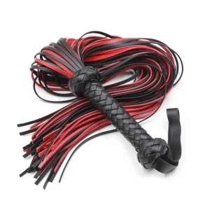 A black BDSM bondage horse whip with a detailed sword-style handle and long lash for erotic spanking and fetish play.