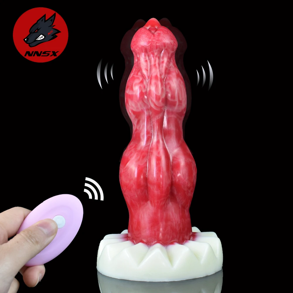 A large textured knot dog dildo with a remote control vibrator and a flared base for safe anal and vaginal use.