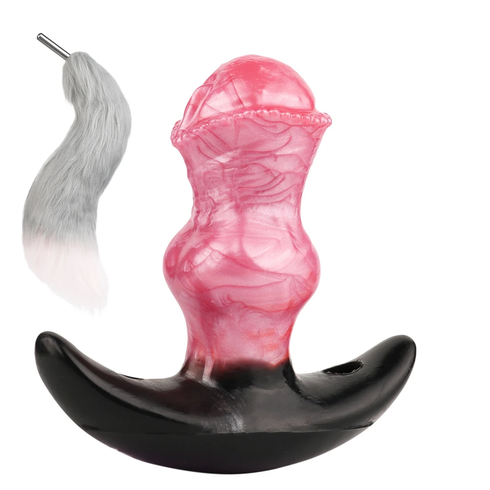 Silicone anal plug vibrator with attached plush fox tail for cosplay and prostate massage.