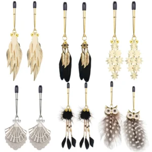 Pair of silver metal nipple clamps featuring white feather charms and small circular bells for sensory SM teasing play.