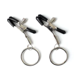 A pair of polished metal hoop nipple clamps for BDSM and fetish sensory play.