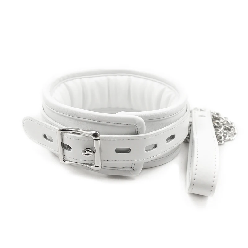 Close-up of a white leather BDSM collar with iron chain links and soft sponge interior on a neutral background.