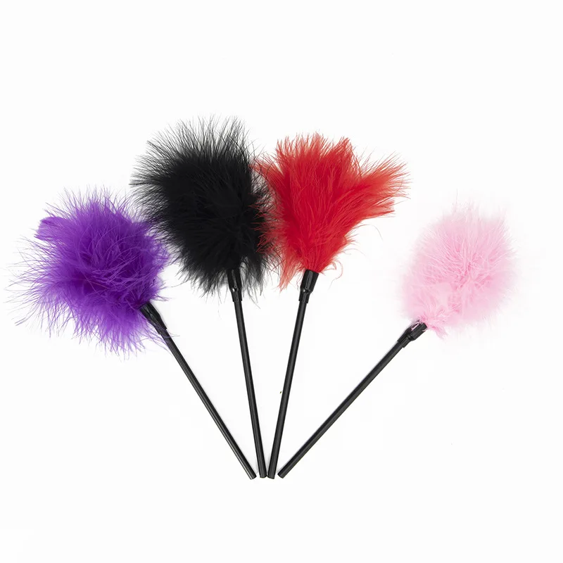 A colorful BDSM riding crop featuring a soft feather tickler on one end and a flogger on the other for adult restraint play.