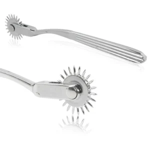 Close-up of a professional stainless steel gear roller massage tool for SM role-play.