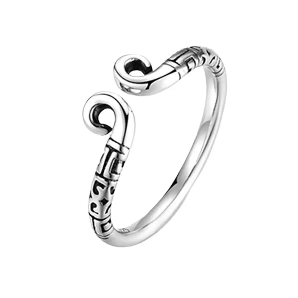 A polished stainless steel glans ring with integrated pressure beads and a secure metal lock for men.
