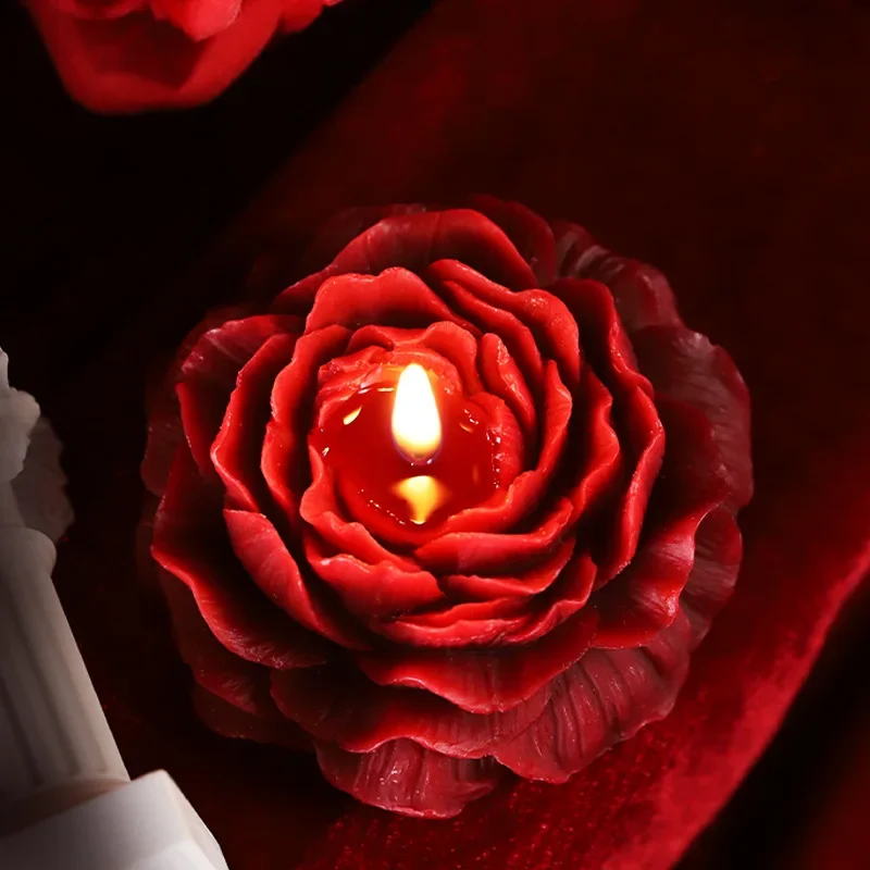 A rose-scented low temperature aromatherapy candle for romantic couple play.