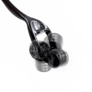 Metal pin wheel gear roller with ergonomic handle for erotic sensory play.