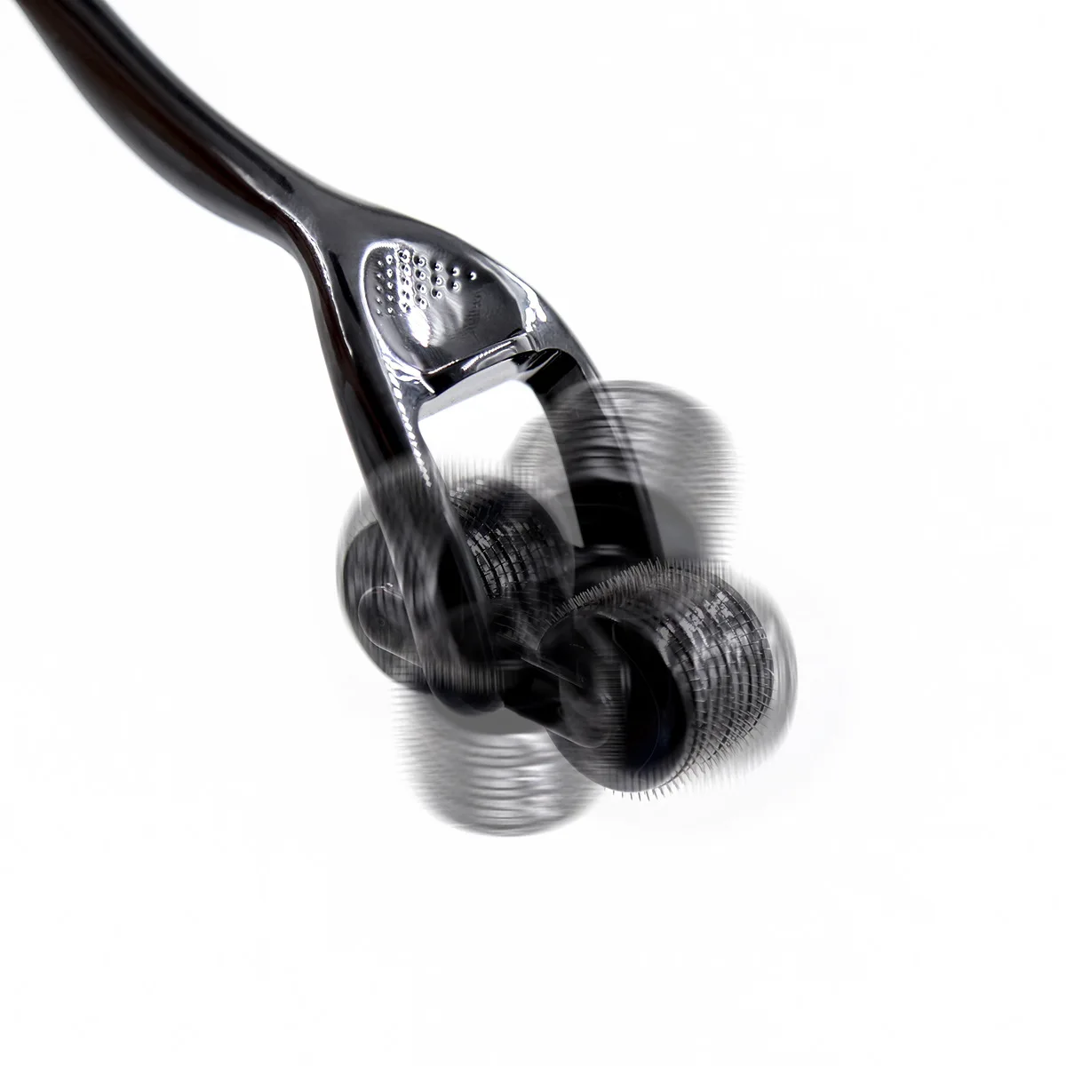 Metal pin wheel gear roller with ergonomic handle for erotic sensory play.